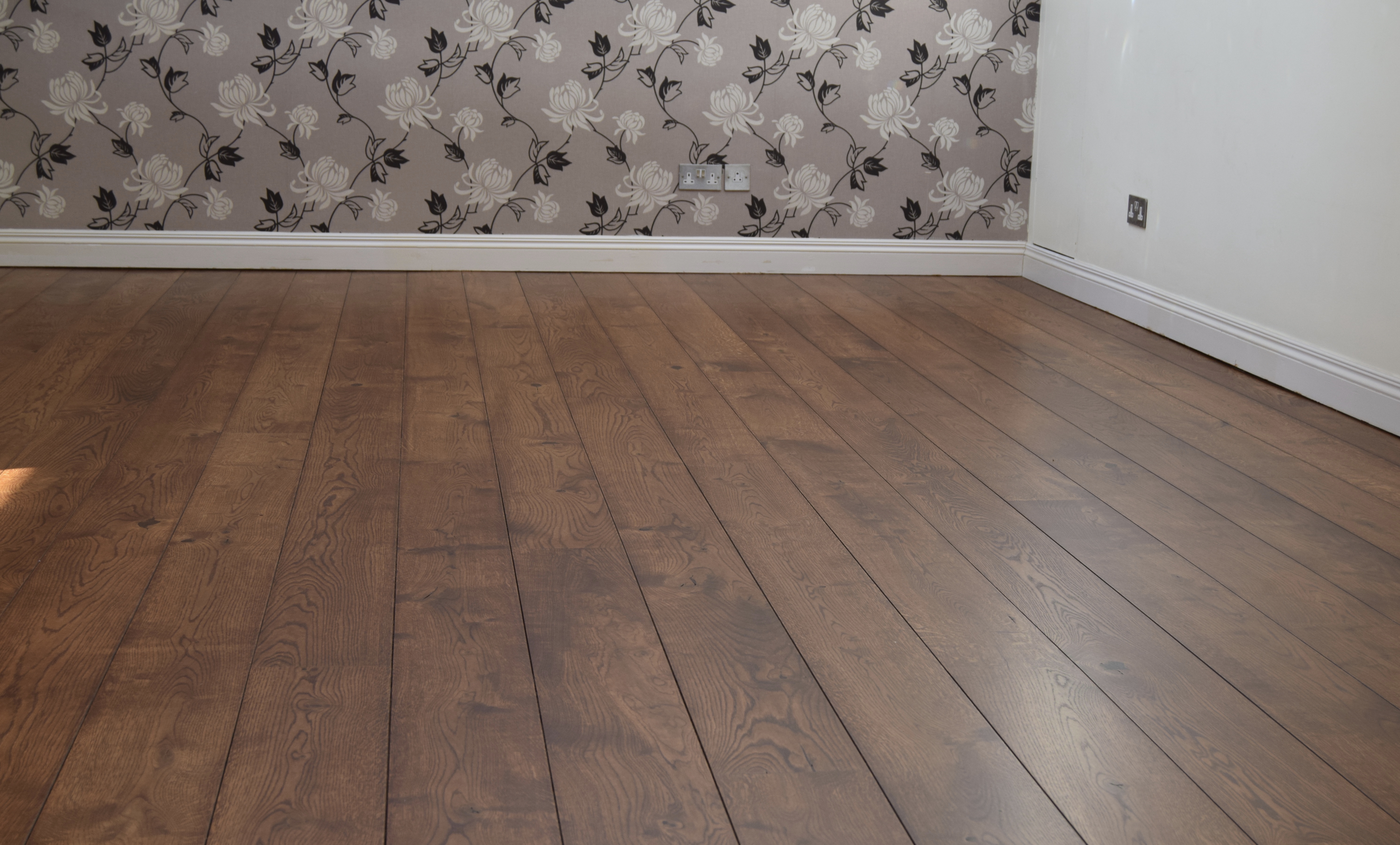 Chestnut earth stain on oak floor